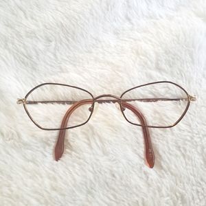 VNTG frames made in Italy. Novo Occhiali petite 48-19 rose gold.